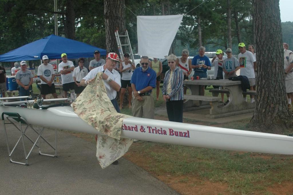 The Bunzl's being presented with rowing boat