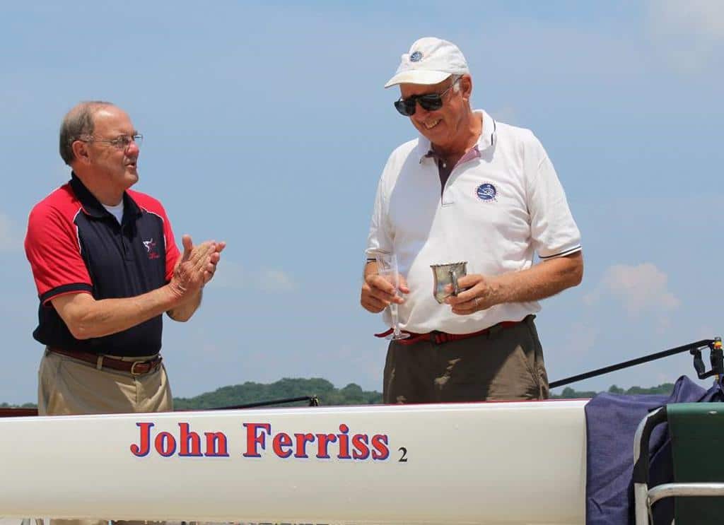 Ferriss pouring water over this rowing boat