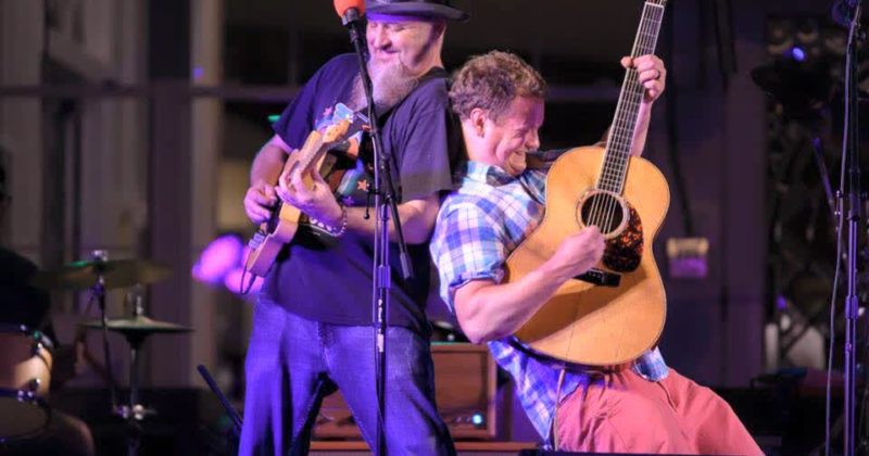 Musicians performing at a concert on stage