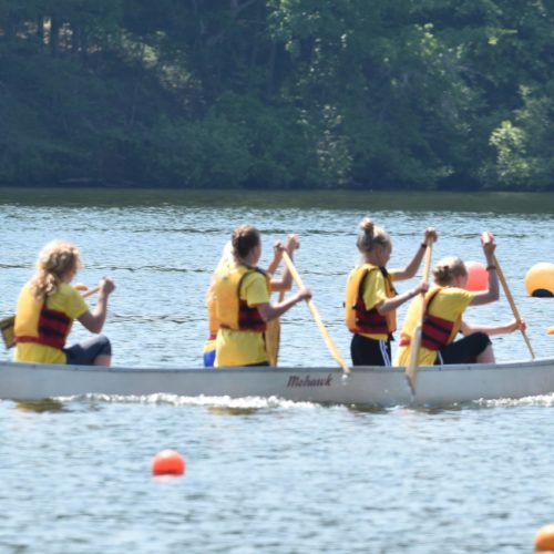 Girls participating a kayaking race