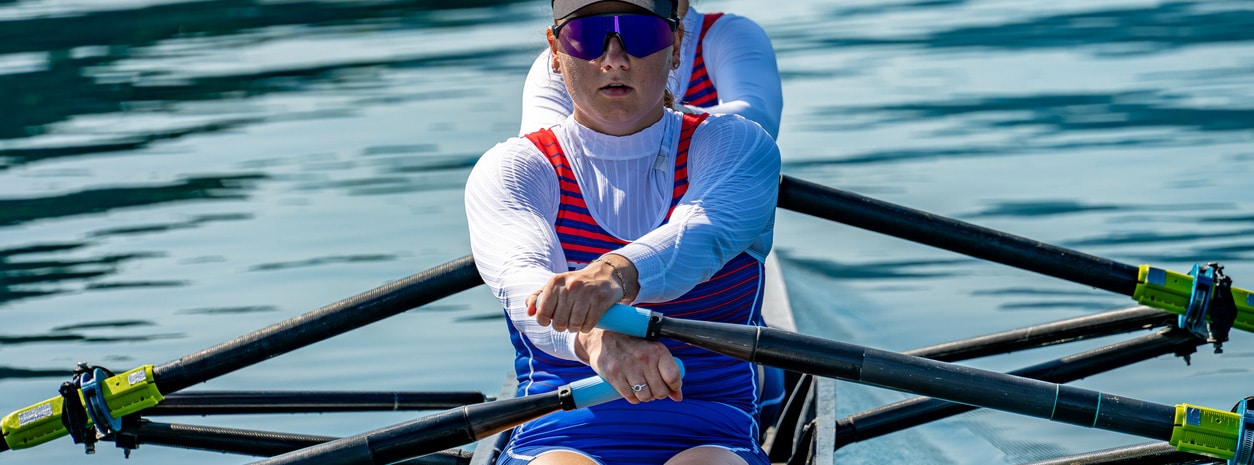 Medium Shot of Women Rowing Strength and Teamwork in Sport